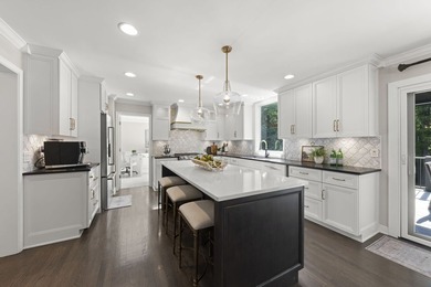 This brick Georgian in River Woods represents a rare convergence - photo 9