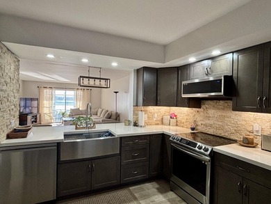 Discover this beautifully renovated 2-bedroom, 2-bathroom condo - photo 3