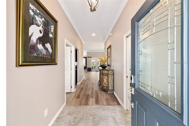 Beautiful new flooring installed June 2026. No carpet in the - photo 3