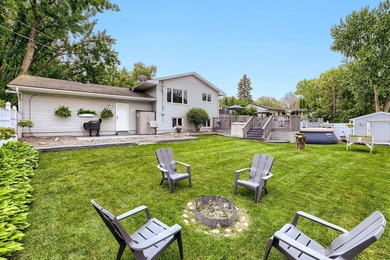 Welcome home to this beautifully maintained split-entry nestled - photo 1