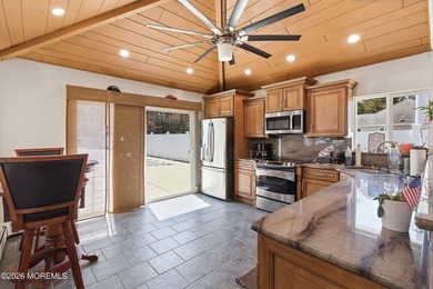 Tucked away on nearly 2 acres of private property, this - photo 3