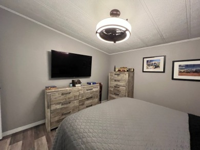 Stunning home located in Reflections on Silver Lake 55+ - photo 32
