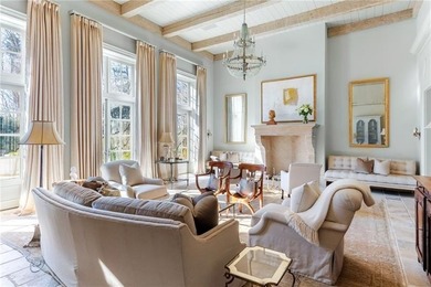 This home is truly magnificent! With its soaring ceilings and - photo 8