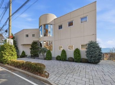 Welcome to 186 Flagg Place, a rare modern masterpiece perched - photo 1