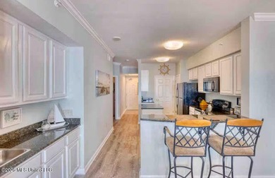 Experience luxury coastal living at its absolute finest in this - photo 11