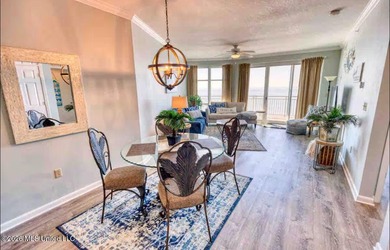 Experience luxury coastal living at its absolute finest in this - photo 12