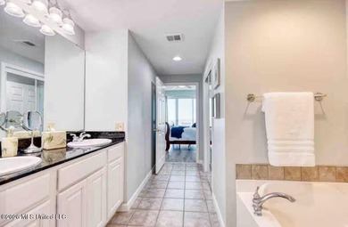 Experience luxury coastal living at its absolute finest in this - photo 16