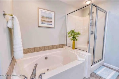 Experience luxury coastal living at its absolute finest in this - photo 17