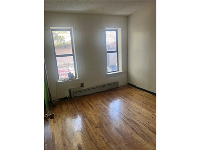 Welcome to this solid brick 4-family attached home located in - photo 4