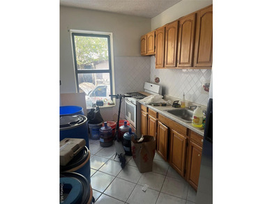 Welcome to this solid brick 4-family attached home located in - photo 5