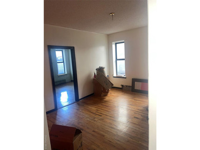 Welcome to this solid brick 4-family attached home located in - photo 8