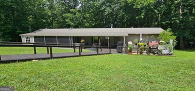 Tucked away at 567 Dale Trail in Menlo, GA, this isn't just a - photo 1