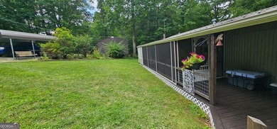 Tucked away at 567 Dale Trail in Menlo, GA, this isn't just a - photo 3