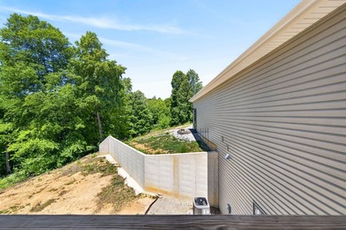 Lake living awaits in this beautiful 2024-built home located - photo 24
