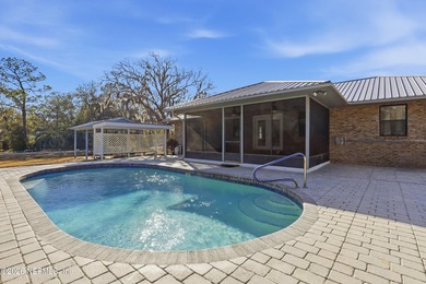 Welcome to this custom built and well loved brick pool home on a - photo 36