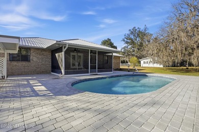 Welcome to this custom built and well loved brick pool home on a - photo 38