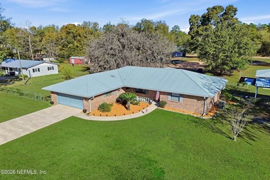 Welcome to this custom built and well loved brick pool home on a - photo 49