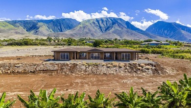 Nestled on 3.02 acres in the gated Puunoa community, 257 - photo 2