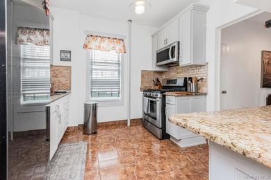 Welcome to 1858 Phelan Place in the Morris Heights section of - photo 6