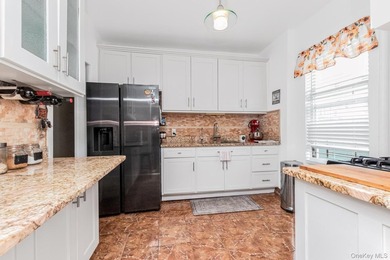 Welcome to 1858 Phelan Place in the Morris Heights section of - photo 7
