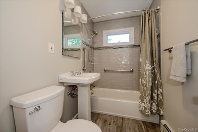 This impeccably maintained expanded Cape Cod offers an abundance - photo 23