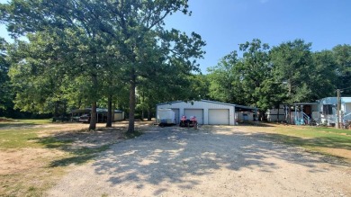 Lake Home For Sale in Log Cabin, Texas