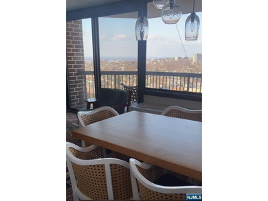 Welcome to this spacious two-bedroom residence at The Greenhouse