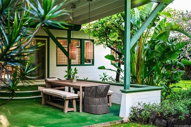 Tucked within a canopy of mature fruit trees and lush tropical - photo 1