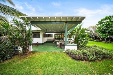 Tucked within a canopy of mature fruit trees and lush tropical - photo 2