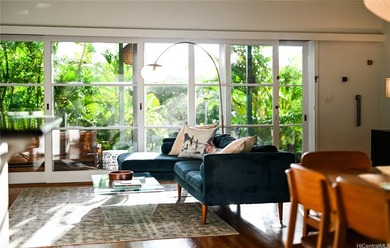 Tucked within a canopy of mature fruit trees and lush tropical - photo 4