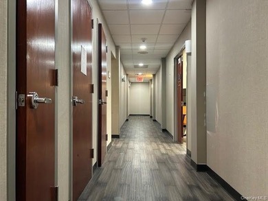 Medical office building on busy Francis Lewis Boulevard. For - photo 9