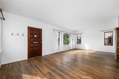 This 1924 low profile Spanish bungalow is located in one of the - photo 13
