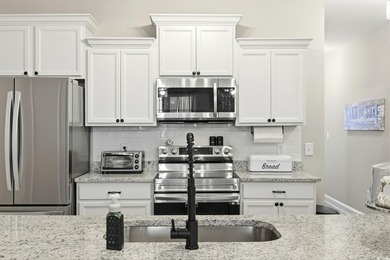 Price Improvement!!! Welcome to 165 Ella Kinley Circle Unit 302!