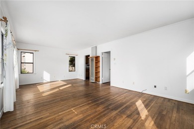 This 1924 low profile Spanish bungalow is located in one of the - photo 15