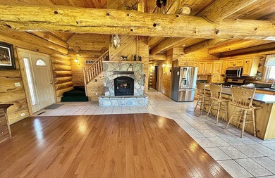 Authentic log cabin retreat on 80 picturesque acres featuring a - photo 15
