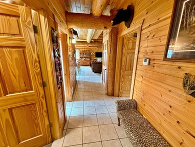 Authentic log cabin retreat on 80 picturesque acres featuring a - photo 20