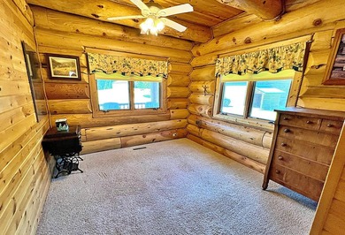 Authentic log cabin retreat on 80 picturesque acres featuring a - photo 22