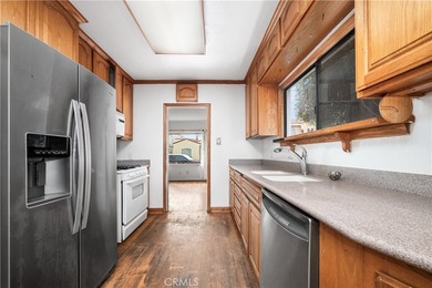 This 1924 low profile Spanish bungalow is located in one of the - photo 23