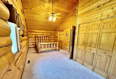 Authentic log cabin retreat on 80 picturesque acres featuring a - photo 24