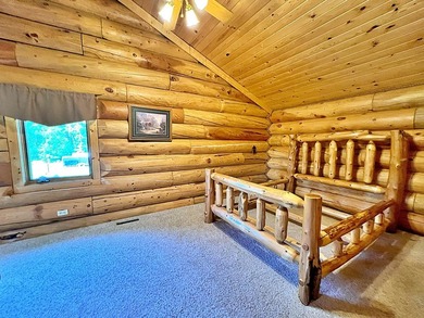 Authentic log cabin retreat on 80 picturesque acres featuring a - photo 25