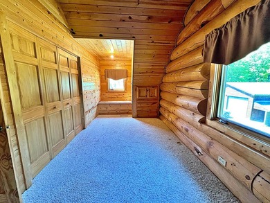 Authentic log cabin retreat on 80 picturesque acres featuring a - photo 27