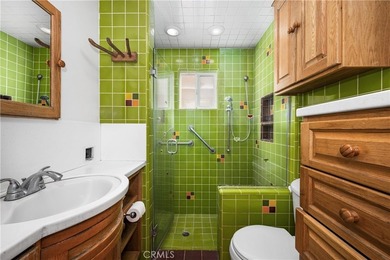 This 1924 low profile Spanish bungalow is located in one of the - photo 29