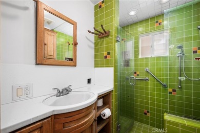 This 1924 low profile Spanish bungalow is located in one of the - photo 30