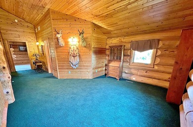 Authentic log cabin retreat on 80 picturesque acres featuring a - photo 32