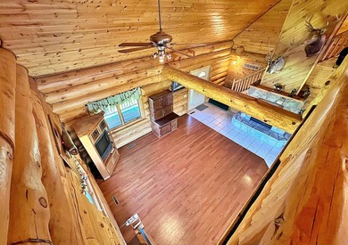 Authentic log cabin retreat on 80 picturesque acres featuring a - photo 33