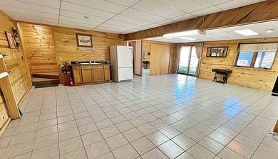Authentic log cabin retreat on 80 picturesque acres featuring a - photo 34