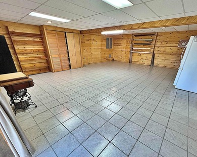 Authentic log cabin retreat on 80 picturesque acres featuring a - photo 39