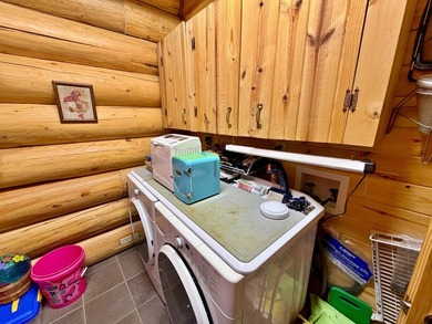 Authentic log cabin retreat on 80 picturesque acres featuring a - photo 40