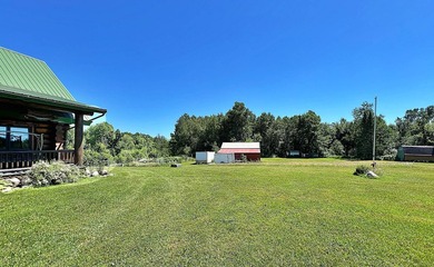 Authentic log cabin retreat on 80 picturesque acres featuring a - photo 45