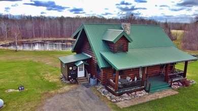 Authentic log cabin retreat on 80 picturesque acres featuring a - photo 46